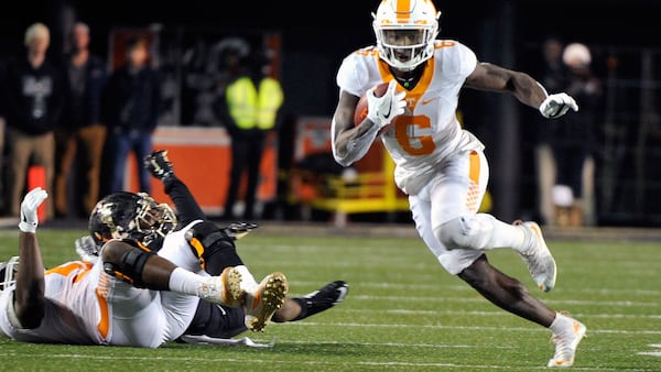 NASHVILLE, TN - NOVEMBER 26:  Alvin Kamara #6 carries the ball against the Vanderbilt Commodores during the second half at Vanderbilt Stadium on November 26, 2016 in Nashville, Tennessee. Vanderbilt defeated Tennessee 45-34.  (Photo by Frederick Breedon/Getty Images)