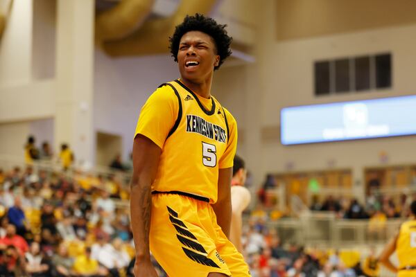 Kennesaw State forward  Brandon Stroud (5) reacts after scoring during the second half against Liberty Flames at the Kennesaw State Convention Center on Thursday, Feb 16, 2023. Miguel Martinez / miguel.martinezjimenez@ajc.com