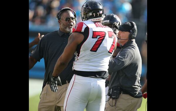 CHARLOTTE: Falcons defensive tackle Ra'Shede Hageman gets into a heated debate with coaches on the sidelines after a defensive series against the Panthers during the first half in a football game on Sunday, Dec. 13, 2015, in Charlotte. Curtis Compton / ccompton@ajc.com