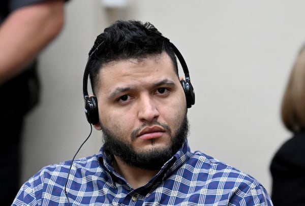 Jose Ibarra listens through an interpreter during his trial at Athens-Clarke County Superior Court, Wednesday, Nov. 20, 2024, in Athens, Ga. (Hyosub Shin/Atlanta Journal-Constitution via AP, Pool)