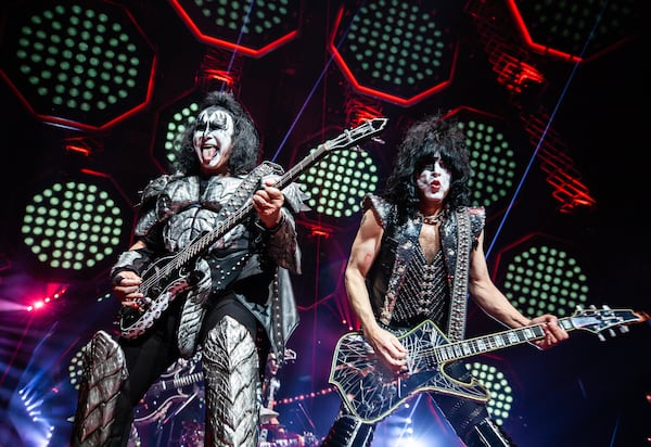 Gene Simmons and Paul Stanley doing what they do best - playing to the camera at State Farm Arena. Photo: Ryan Fleisher/Special to the Atlanta Journal-Constitution