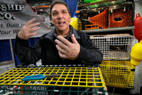 Lobsterman John Drouin, who fishes waters on the border between the United States and Canada, expresses his views on how President Trump's planned tariffs will create new challenges for both country's fishing industry, Thursday, Feb. 27, 2025, in Rockport, Maine. (AP Photo/Robert F. Bukaty)