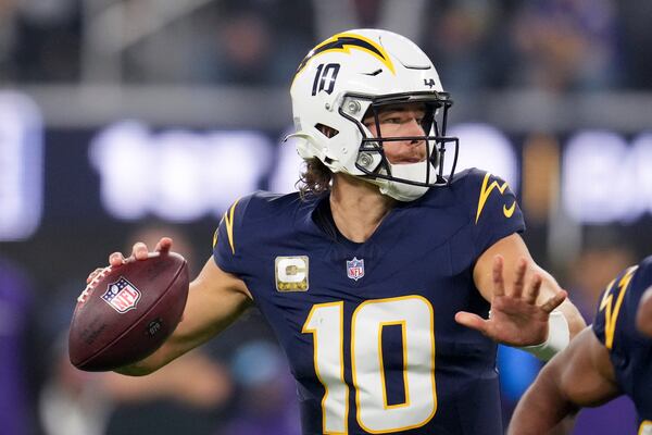 Los Angeles Chargers quarterback Justin Herbert (10) throws a pass during the first half of an NFL football game against the Baltimore Ravens, Monday, Nov. 25, 2024, in Inglewood, Calif. (AP Photo/Eric Thayer)