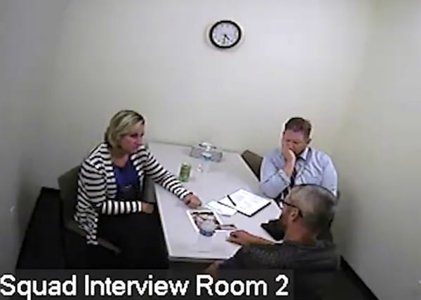 Chris Watts, foreground, talks to Colorado Bureau of Investigation Agent Tammy Lee, left, and FBI Agent Grahm Coder Aug. 15, 2018, at the Frederick Police Department about the disappearance two days earlier of his pregnant wife, Shanann Watts, 34, and their daughters, Bella, 4, and 3-year-old Celeste. After speaking to his father for about 10 minutes, Chris Watts admitted to strangling his wife, claiming he did so in a rage after seeing her kill the girls, a claim investigators did not believe. Chris Watts pleaded guilty to all three killings Nov. 6 and has been sentenced to five life terms in prison.