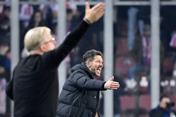 Atletico's head coach Diego Simeone (right) gestures during the UEFA Champions League opening match between Sparta Prague and Athletico Madrid in Prague, Czech Republic, Tuesday, November 26, 2024. (Roman Vondrous/CTK via AP)