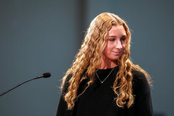 Lakeside High School student Anna Katz leaves the podium after speaking to the DeKalb County Board of Education with concern for Lakeside’s dress code policy at the board meeting Monday, Feb. 13, 2023, in Stone Mountain. (Jason Getz / Jason.Getz@ajc.com)
