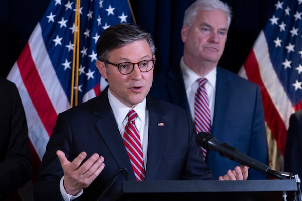 Speaker of the House Mike Johnson, R-La., joined at right by Whip Tom Emmer, R-Minn., makes a point as House Republican leaders hold a news conference ahead of President Donald Trump's address to a joint session of Congress, on Capitol Hill in Washington on Tuesday. J. Scott Applewhite/AP