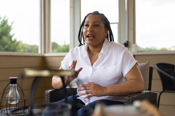 Playwright Kelundra Smith talks about her play "The Wash" at her home in Loganville. (Arvin Temkar / AJC)