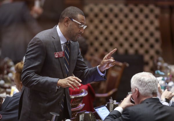 February 20, 2020 - Atlanta - Rep. Vernon Jones, D - Lithonia, confers with a colleague as the General Assembly returned for the 16th legislative day. Bob Andres / robert.andres@ajc.com