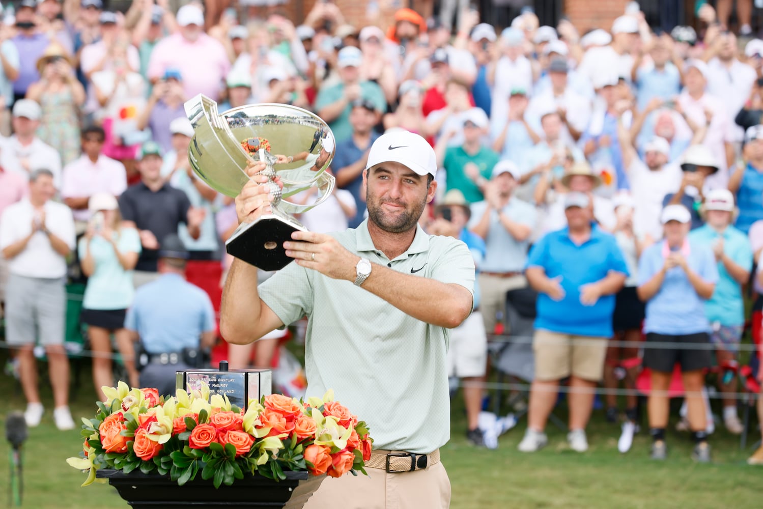 Scottie Scheffle celebrates with the FedEx Cup trophy after winning the Tour Championship at East Lake Golf Club, Sunday, Sept. 1, 2023, in Atlanta. 
(Miguel Martinez / AJC)