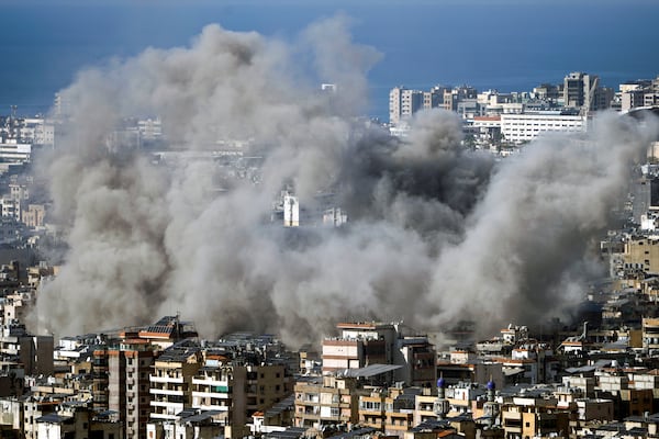 Smoke rises after an Israeli airstrike on Dahiyeh, in the southern suburb of Beirut, Lebanon, Saturday, Nov. 16, 2024. (AP Photo/Bilal Hussein)