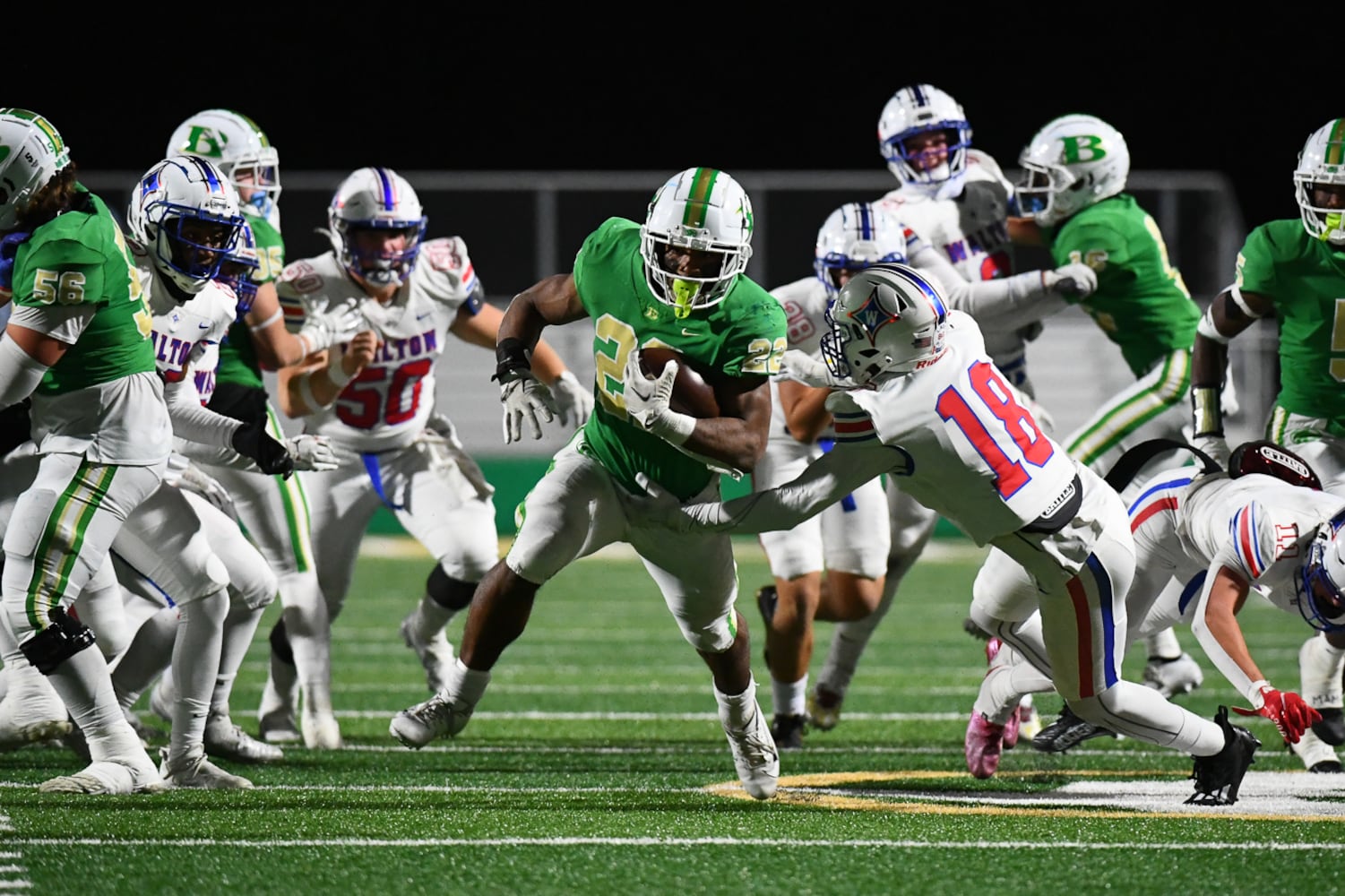 Justice Haynes, running back for Buford, runs for a touchdown during the Walton vs. Buford game on Friday, Nov. 18, 2022, at Buford High School. (Jamie Spaar for the Atlanta Journal Constitution)