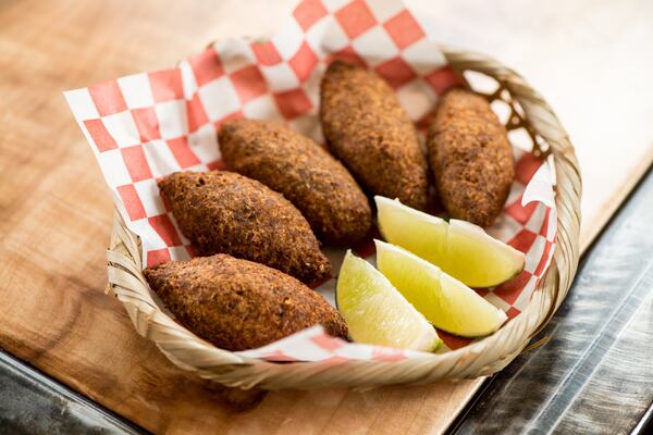 Buteco Quibe, croquettes of beef, bulgur wheat, and mint with fresh lime. Photo credit- Mia Yakel.