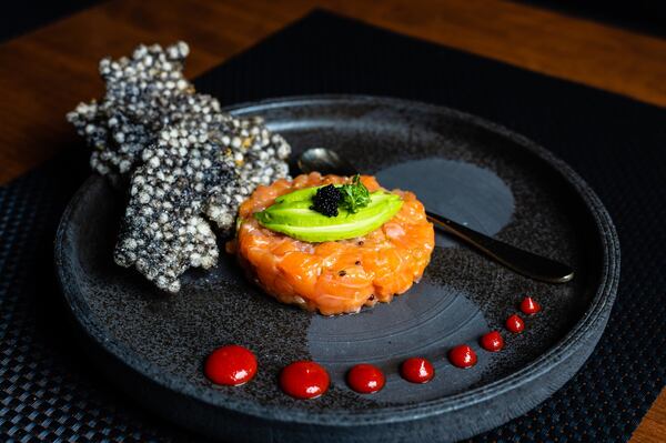 Salmon shiso avocado tartare is one of three tartares offered at District M. They all come with tapioca tostadas. CONTRIBUTED BY HENRI HOLLIS