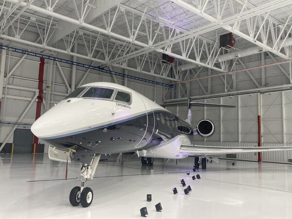 A flight test model of the Gulfstream G700 sits in a maintenance hangar at the Gulfstream Savannah Service Center East. (Adam Van Brimmer/AJC)