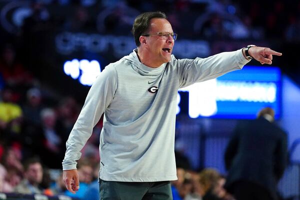 Georgia head coach Tom Crean directs his players from the bench during the first half of an NCAA college basketball game against Memphis Wednesday, Dec. 1, 2021, in Athens, Ga. (AP Photo/John Bazemore)