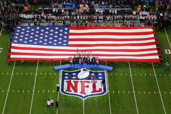 MINNEAPOLIS, MN - FEBRUARY 04:  Pink sings the national anthem prior to Super Bowl LII between the New England Patriots and the Philadelphia Eagles at U.S. Bank Stadium on February 4, 2018 in Minneapolis, Minnesota.  (Photo by Rob Carr/Getty Images)