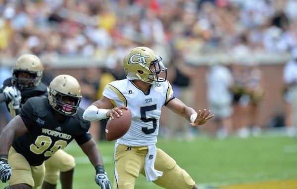 Justin Thomas had a nice starting debut -- as a passer. (Hyosub Shin/AJC)