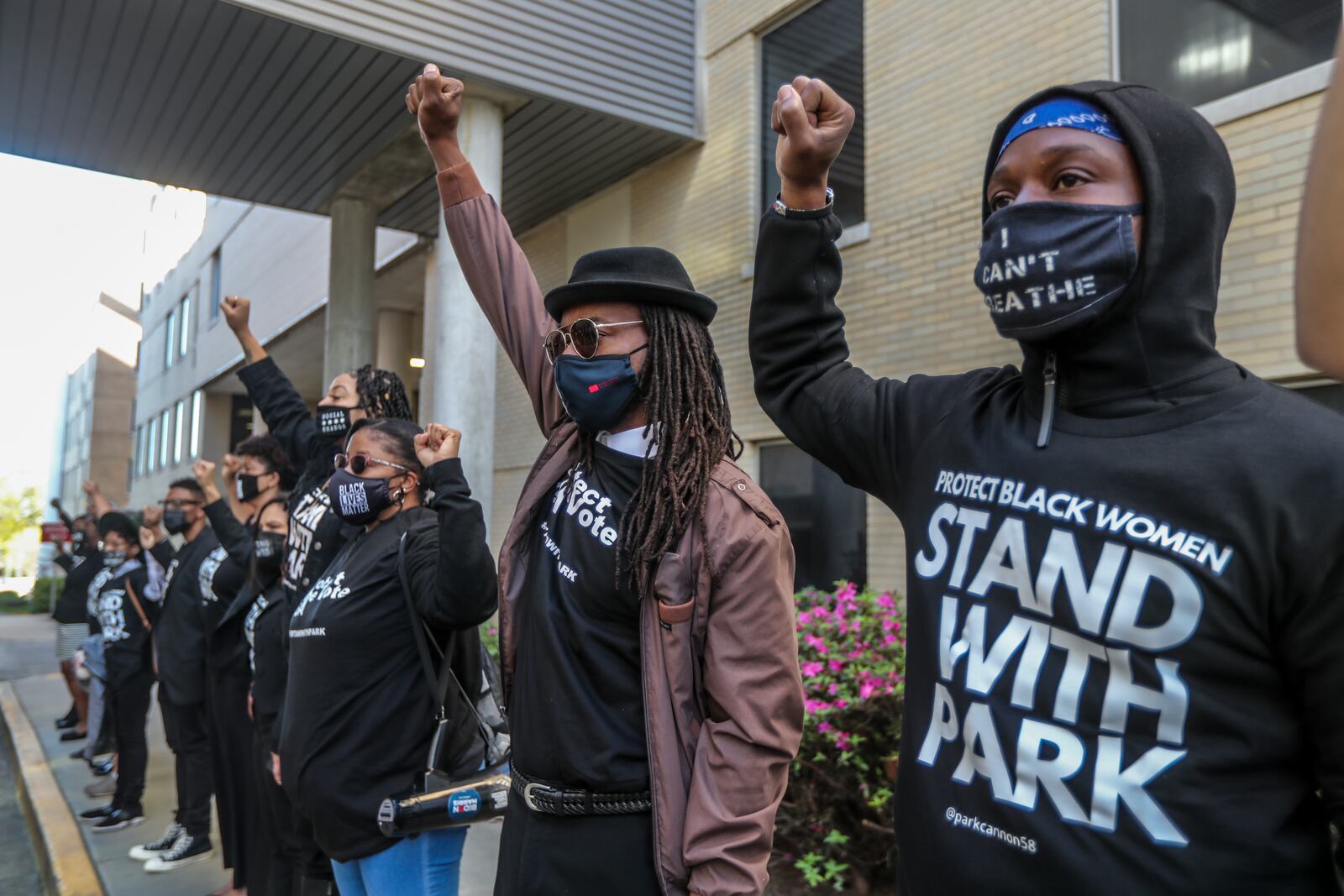 In 2021, silent protesters waited to march with State Rep. Park Cannon, D-Atlanta, as she returned to the Capitol following her arrest there.