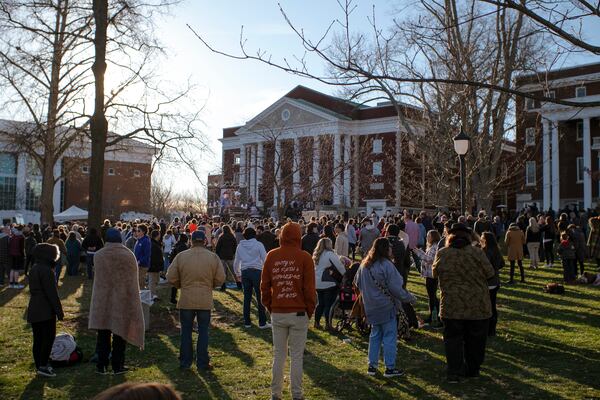 Attendees gather around a screen broadcasting worship services inside Hughes Chapel on the campus of Asbury University in Wilmore, Ky., on Feb. 18, 2023. Over two weeks, more than 50,000 people descended on a small campus chapel to experience the nation’s first major spiritual revival in decades — one driven by Gen Z. (Jesse Barber/The New York Times)