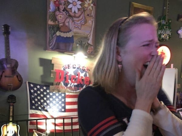 Dana Borda reacts as the Braves head to the 2021 World Series. She was in a restaurant in South Carolina with her son's baseball team when the Braves clinched the National League Pennant.