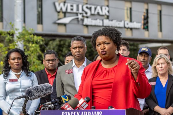 Stacey Abrams speaks a news conference alongside health care providers outside the WellStar Atlanta Medical Center on Sept. 2, 2022. (Steve Schaefer / steve.schaefer@ajc.com)