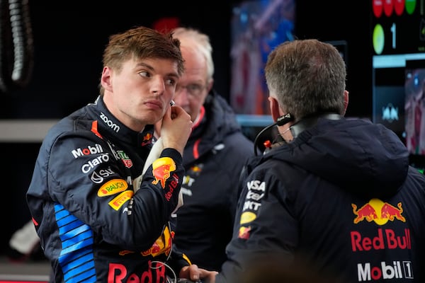 Red Bull driver Max Verstappen, of the Netherlands, talks with his crew after the final practice session for the Formula One U.S. Grand Prix auto race, Friday, Nov. 22, 2024, in Las Vegas. (AP Photo/John Locher)