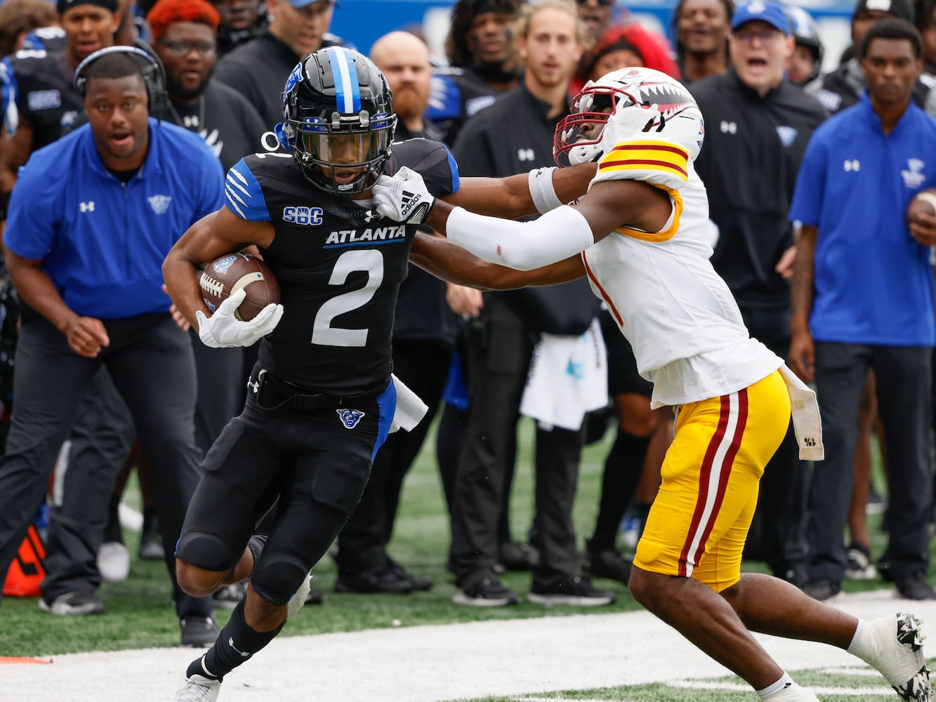 Georgia State Panthers wide receiver Jamari Thrash hauls in a long first-quarter pass from Darren Grainger over  Louisiana-Monroe Warhawks cornerback Deuce Mayberry.   (Bob Andres for the Atlanta Journal Constitution)