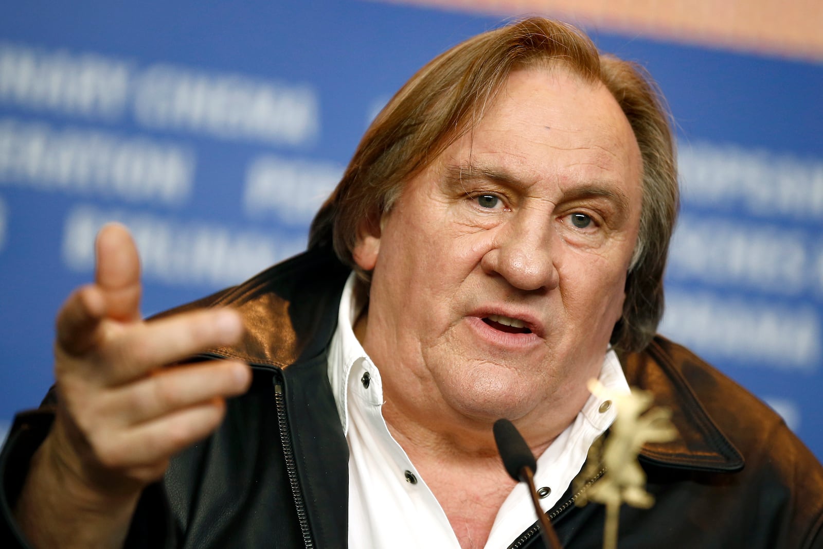 FILE - Actor Gerard Depardieu addresses the media during the press conference for the film 'Saint Amour' at the 2016 Berlinale Film Festival in Berlin, Germany, on Feb. 19, 2016. (AP Photo/Axel Schmidt, File)