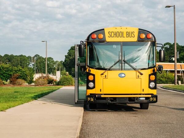 A school bus waiting to pick up students. (Photo Courtesy of Justin Taylor/The Current GA)