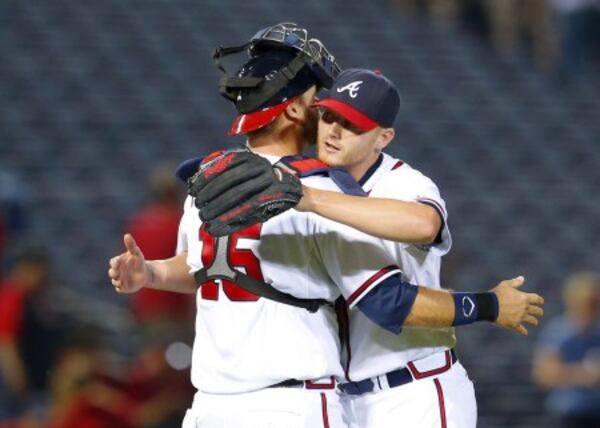 Sheby Miller gets a hug from Braves catcher A.J. Pierzynski after tossing a three-hit shutout against the Phillies in May. Miller hasn't won a game in his past 22 starts, a period of more than four months. (AP photo)