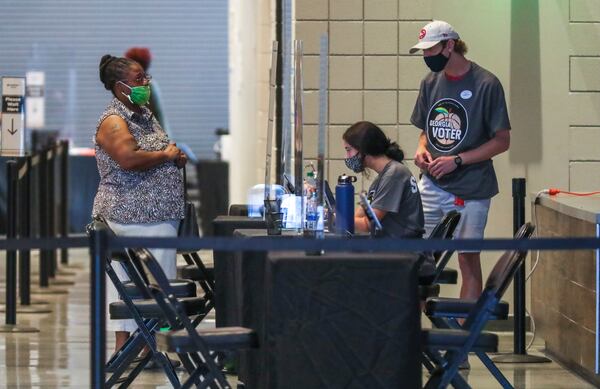 State officials say they need over 20,000 poll workers to man precincts across Georgia for Election Day on Nov. 3. JOHN SPINK/JSPINK@AJC.COM

