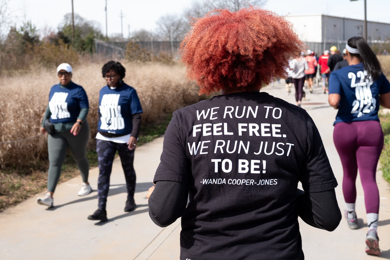 Lisa Gausney makes her way along the Atlanta Beltline during the 2.23 mile Ahmaud Arbery Day Run in Atlanta on Sunday, Feb. 23, 2025, to mark the anniversary of the day Arbery was killed while out on a run near Brunswick.   Ben Gray for the Atlanta Journal-Constitution