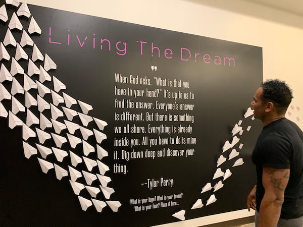 Jahon Pilichowski, a Los Angeles-based event planner, helped design the Tyler Perry exhibit at the Tubman Museum with Ashley Brown. RODNEY HO/rho@ajc.com