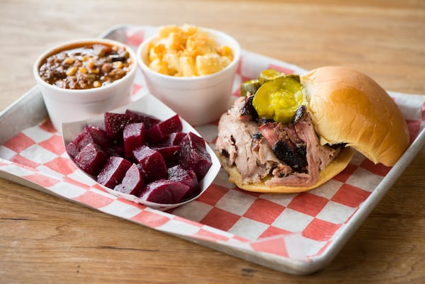 King Barbecue Pulled Pork Sandwich with pickled beets, Brunswick stew, and mac and cheese. Photo credit- Mia Yakel.