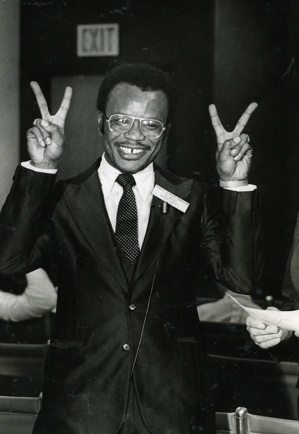 Robbie Robinson is all smiles in the courtroom. This photo was taken June 8, 1982.