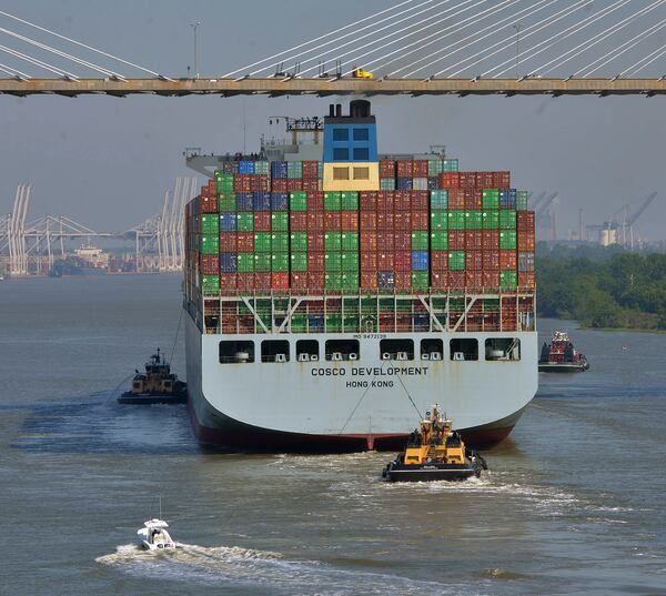 The giant container ship COSCO Development passes under the Talmadge Bridge (barely) in May 2017. The ship is the largest vessel ever to call on a port on the U.S. East Coast. (Steve Bisson/Savannah Morning News)