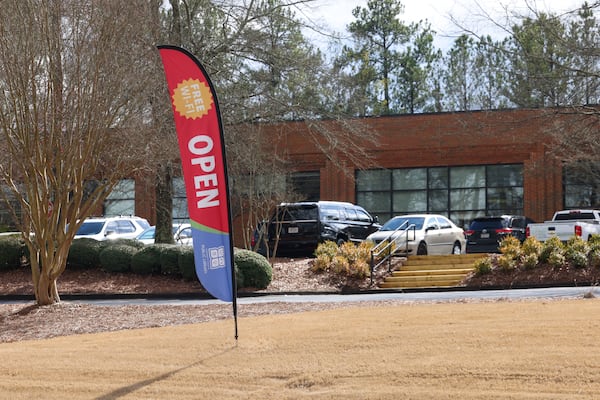 The exterior of the Peachtree Corners Library, Wednesday, Jan. 25, 2023, in Peachtree Corners, Ga.. The library reopened Tuesday after being closed for a week for bed bug treatment. Jason Getz / Jason.Getz@ajc.com)
