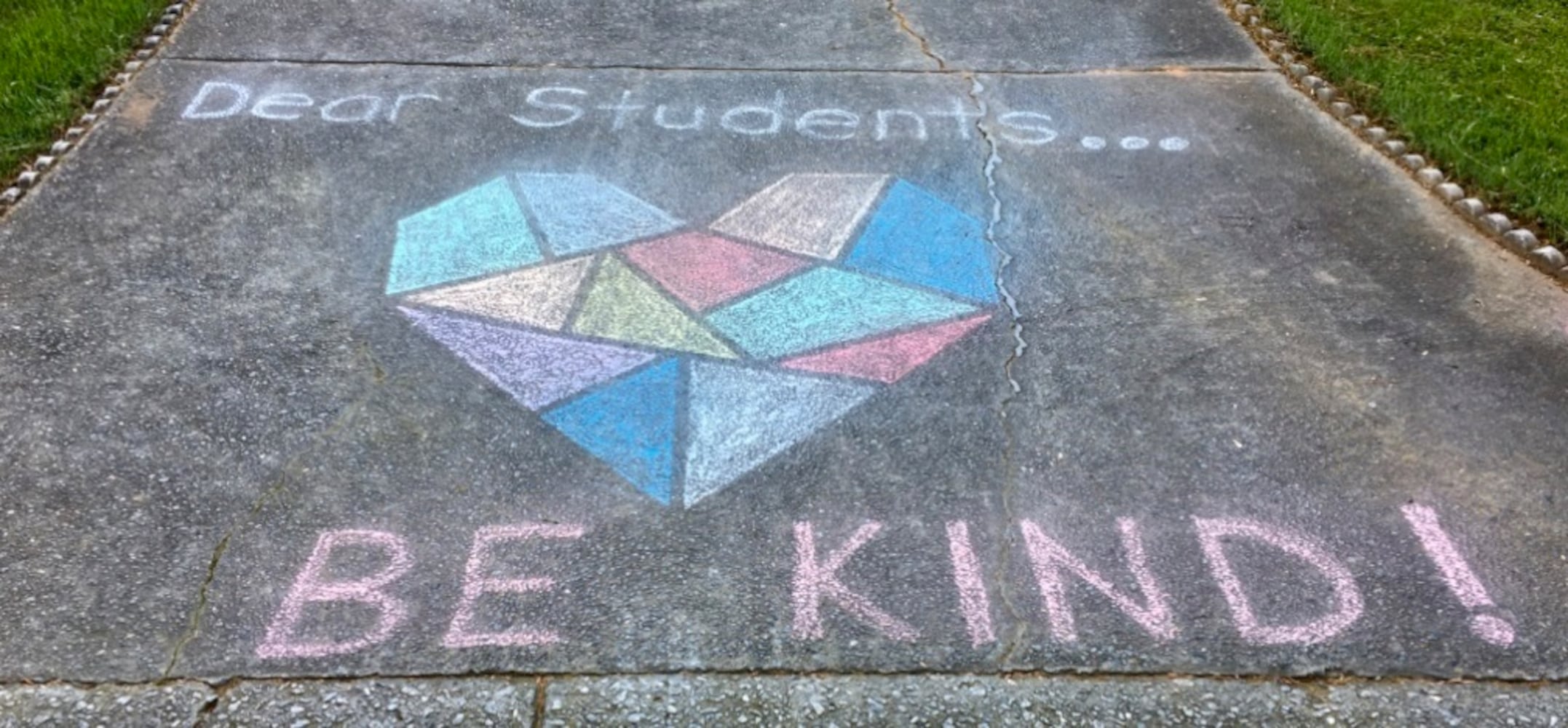 Photos: Teacher’s chalk art inspires students