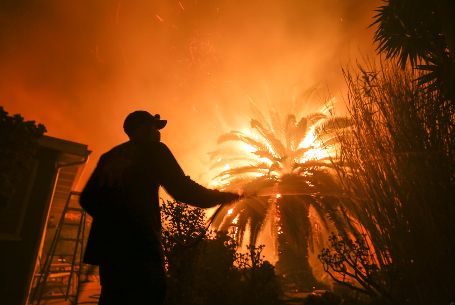 Photos: Deadly wildfires blaze through northern, southern California