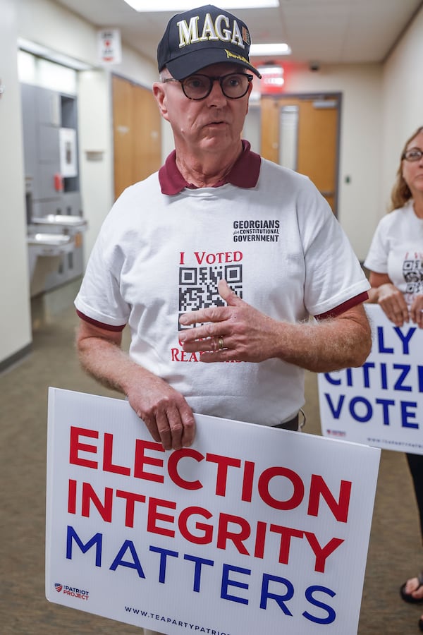 Brian Parker, a Banks County resident, was not impressed by the testing of voting equipment the secretary of state's office conducted Wednesday in Hall County. “It’s to comfort the sheep, to comfort the public that are not paying attention to the details,” said Parker, who wants the state to use hand-counted paper ballots.  (Natrice Miller/ AJC)