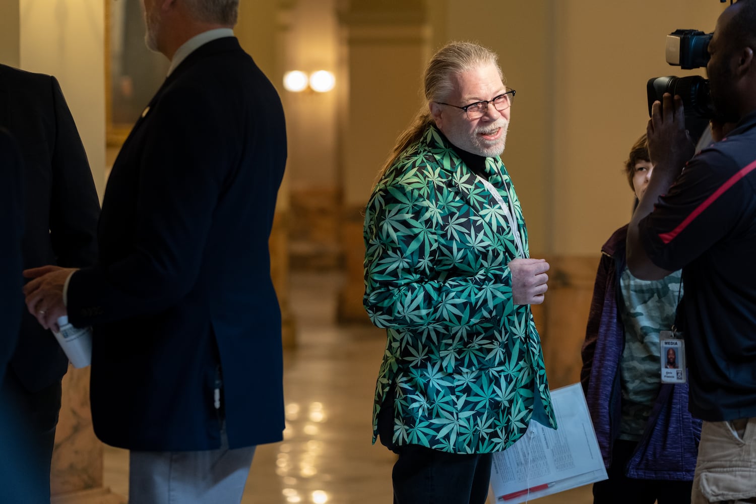 220307-Atlanta-Republican Leland Olinger talks to a journalist about legalizing marijuana while waiting in line to qualify for state Senate on Monday, Mar. 7, 2022 at the Georgia State Capitol. Ben Gray for the Atlanta Journal-Constitution