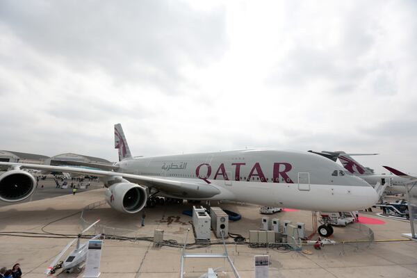 An Airbus SAS A380 aircraft, operated by Qatar Airways Ltd., stands on display on the opening day of the 51st International Paris Air Show in Paris, France, on Monday, June 15, 2015. The 51st International Paris Air Show is the world's largest aviation and space industry exhibition and takes place at Le Bourget airport June 15 - 21. Photographer: Jason Alden/Bloomberg