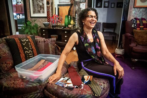 Kira Vivian, the daughter of C.T. Vivian, talks about her father's ties that she is gifting to friends of the late civil rights leader in her Atlanta home Monday, July 26, 2021. (Steve Schaefer for The Atlanta Journal-Constitution)