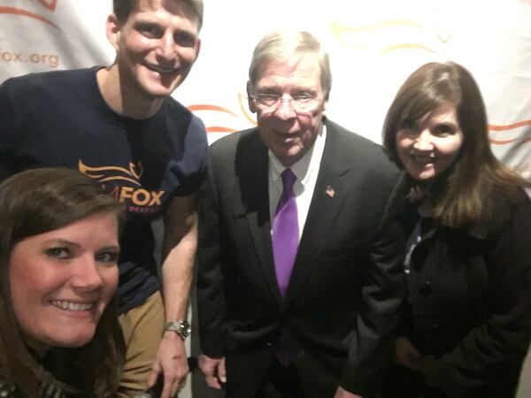 U.S. Sen. Johnny Isakson poses with Max Bluestein, Joan Carr and Amanda Maddox at a fundraiser for Parkinson's disease research in 2016.