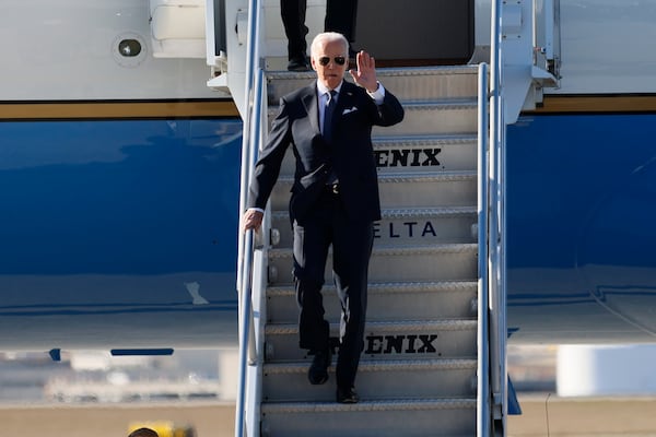 President Joe Biden arrives in Atlanta on Air Force One, where he is scheduled to deliver remarks at Ebenezer Baptist Church with Sen. Raphael Warnock on Sunday, January 15, 2023. Biden is the first seated president to speak at the church on a Sunday regular service. Miguel Martinez / miguel.martinezjimenez@ajc.com