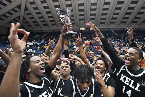 Kell’s players celebrate their victory during 2023 GHSA Basketball Class 5A Boy’s State Championship game at the Macon Centreplex, Thursday, March 9, 2023, in Macon, GA. Kell won 61-53 over Eagle's Landing. (Hyosub Shin / Hyosub.Shin@ajc.com)