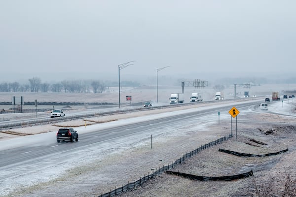 Motorists make their way along Interstate 380 in North Liberty, Iowa, on Saturday, Dec. 14, 2024. (Nick Rohlman/The Gazette via AP)