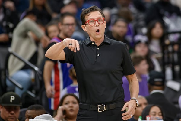 Atlanta Hawks head coach Quin Snyder shouts instructions from the sideline during the first half of an NBA basketball game against the Sacramento Kings in Sacramento, Calif., Monday, Nov. 18, 2024. (AP Photo/Randall Benton)