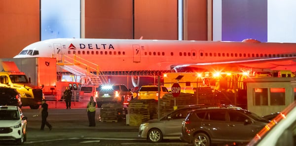 Emergency crews outside the Delta Air Lines maintenance facility.